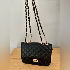 Black quilted purse with chain strap